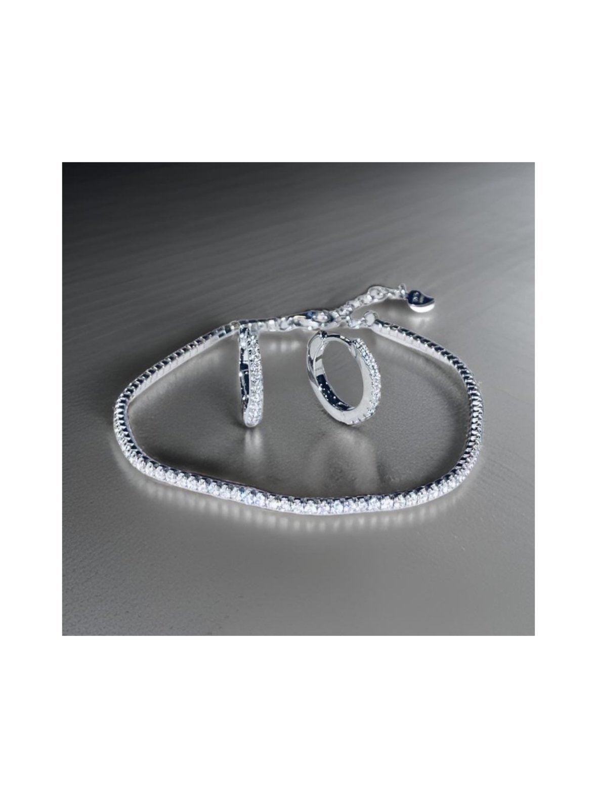 Hopeinen tennis rannekoru ja rengas korvakoru setti