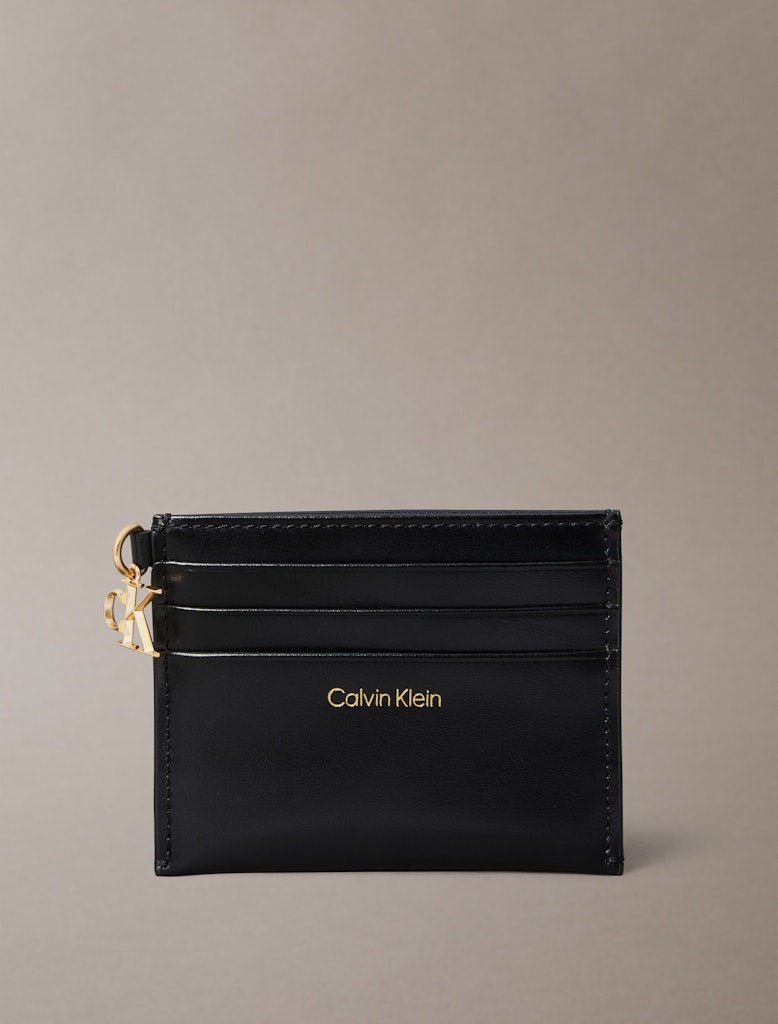 Calvin Klein Accessories korttikotelo, CK PULLER 6CC ZIP CARDCASE Musta