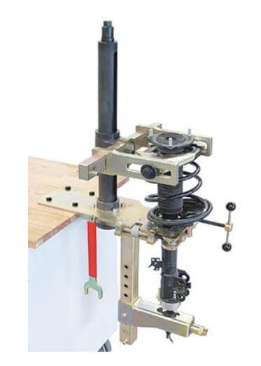 Kiinteäasenteinen MacPherson jousipuristin, Klann