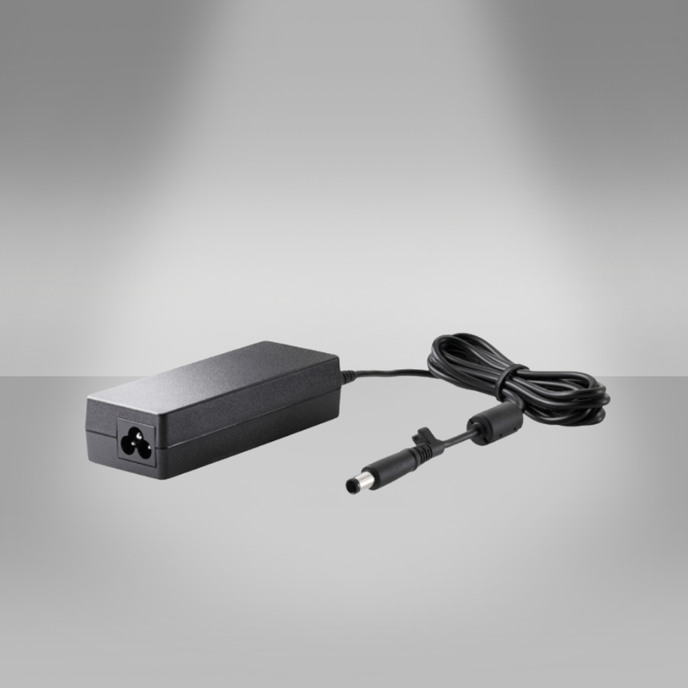 Käytetty HP 65W virtalähde kannettavaan tietokoneeseen