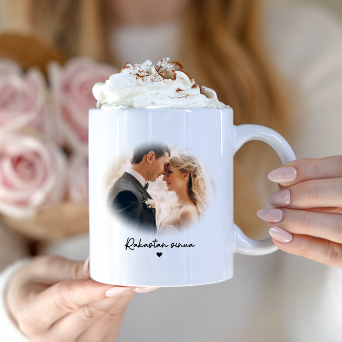 Muki kuvalla ja tekstillä