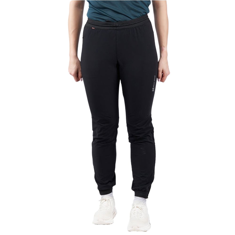 Non-stop dogwear W's Canix Warm-Up Pants Black/Orange
